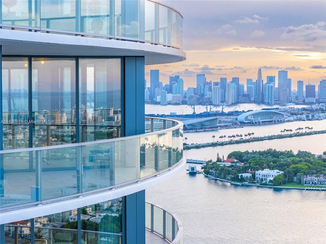 500 Alton Rd Unit 3703, Miami Beach, FL 33139 - balcony at dusk with a view of skyline and a water view
