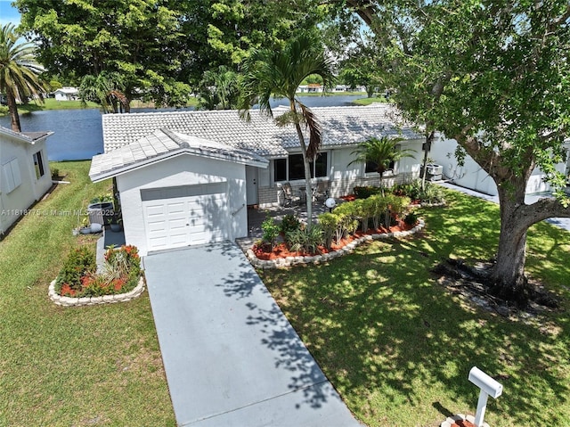 1081 NW 89th Ave, Plantation, FL 33322 - single story home featuring an attached garage, a front yard, a tile roof, and concrete driveway