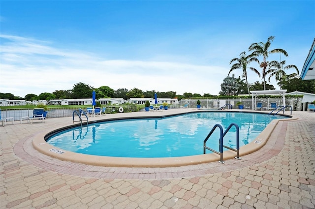 1081 NW 89th Ave, Plantation, FL 33322 - community pool with a patio