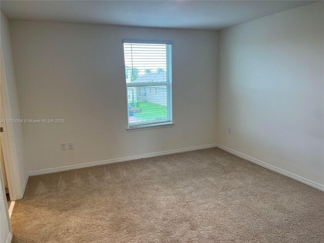 12035 Holystone St, Winter Garden, FL 34787 - carpeted spare room with baseboards