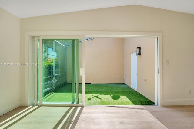 9550 W Heather Ln, Miramar, FL 33025 - interior space with wood finished floors and lofted ceiling