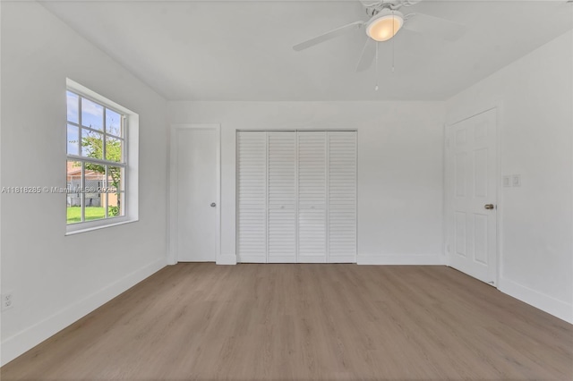 9550 W Heather Ln, Miramar, FL 33025 - unfurnished bedroom with light wood finished floors, a closet, and a ceiling fan