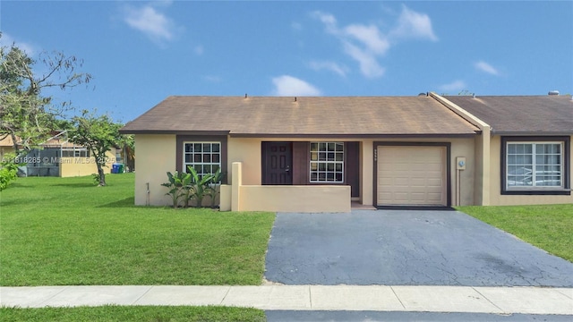 9550 W Heather Ln, Miramar, FL 33025 - ranch-style home with stucco siding, a front yard, asphalt driveway, a garage, and roof with shingles