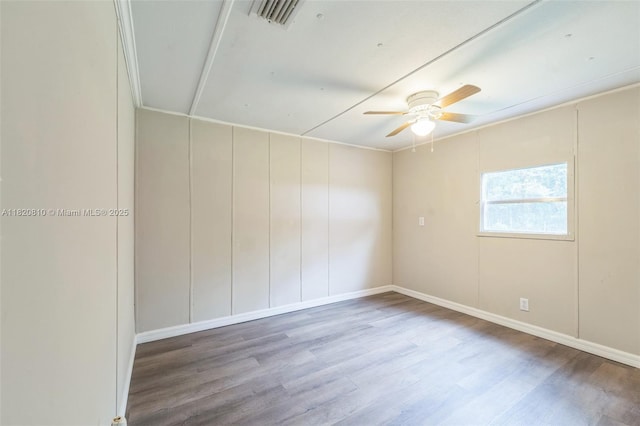 160 SW 9th Ave Fl, Lake Butler, FL 32054 - spare room with wood finished floors and a ceiling fan
