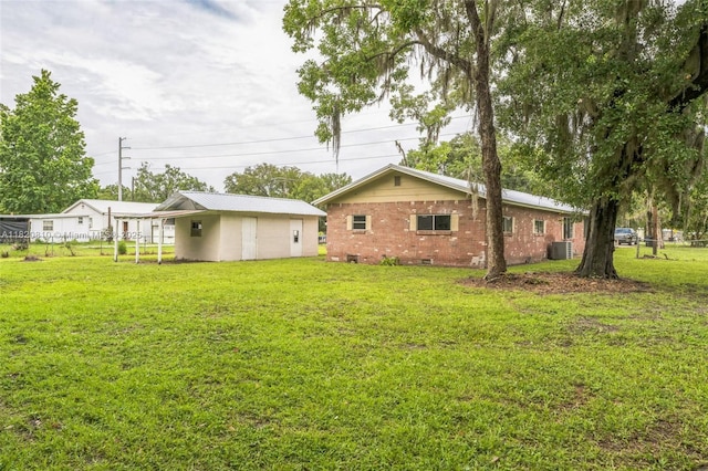 160 SW 9th Ave Fl, Lake Butler, FL 32054 - back of property with brick siding and a yard