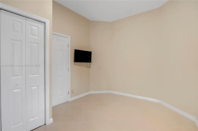 1753 Aspen Ln, Weston, FL 33327 - unfurnished bedroom with a closet and light tile patterned floors