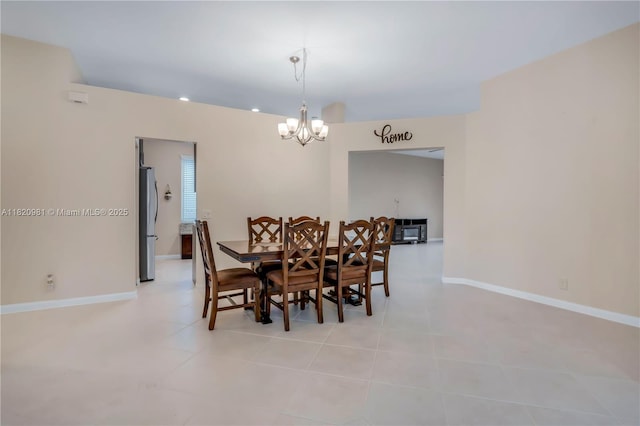 1753 Aspen Ln, Weston, FL 33327 - dining area featuring a chandelier and baseboards