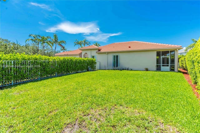 1753 Aspen Ln, Weston, FL 33327 - back of property with a tile roof, stucco siding, and a sunroom