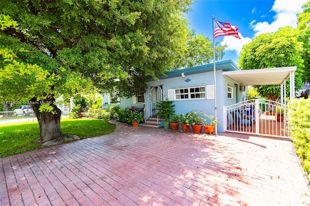 7110 SW 13th Ter, Miami, FL 33144 - view of front of house featuring stucco siding and entry steps