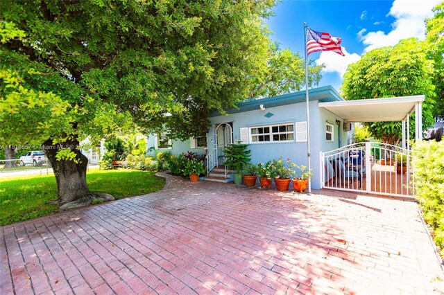 7110 SW 13th Ter, Miami, FL 33144 - view of front of house featuring stucco siding and entry steps