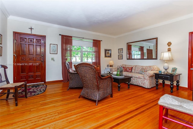 7110 SW 13th Ter, Miami, FL 33144 - living area with light wood finished floors and ornamental molding