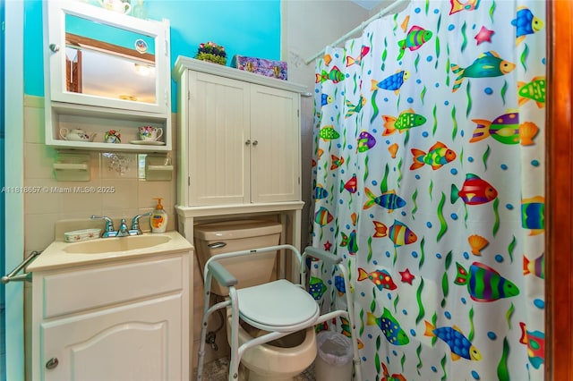 7110 SW 13th Ter, Miami, FL 33144 - bathroom featuring vanity, a shower with shower curtain, and tile walls