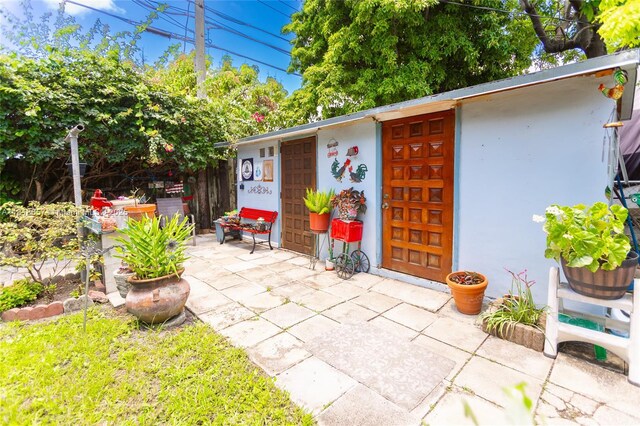 7110 SW 13th Ter, Miami, FL 33144 - view of patio / terrace featuring an outdoor structure