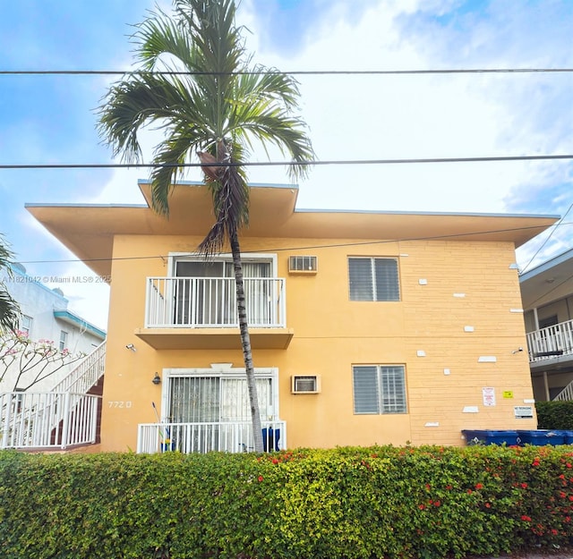 7720 Harding Ave Unit 3, Miami Beach, FL 33141 - view of building exterior featuring an AC wall unit
