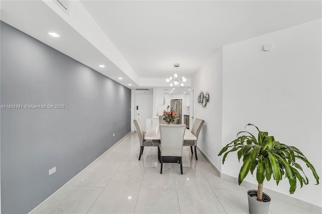 999 Brickell Bay Dr Unit 711, Miami, FL 33131 - dining area with a chandelier, recessed lighting, and light tile patterned floors