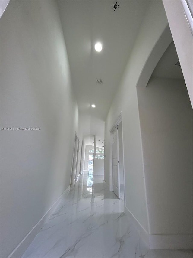 1507 SE 20th Rd, Homestead, FL 33035 - corridor featuring arched walkways, recessed lighting, and marble finish floors