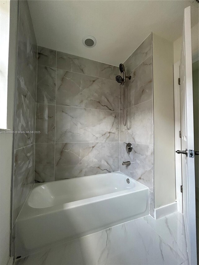 1507 SE 20th Rd, Homestead, FL 33035 - bathroom featuring bathing tub / shower combination and marble finish floors