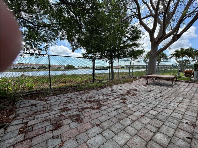 1507 SE 20th Rd, Homestead, FL 33035 - view of patio featuring a water view