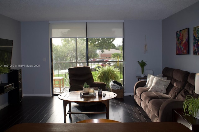 8015 SW 107th Ave Unit 220, Miami, FL 33173 - living area featuring dark wood-type flooring and baseboards