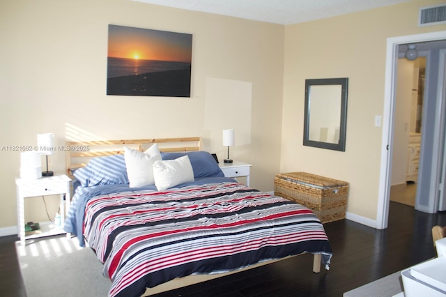 8015 SW 107th Ave Unit 220, Miami, FL 33173 - bedroom with baseboards and wood finished floors