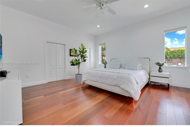 17050 SW 90th Ave, Palmetto Bay, FL 33157 - bedroom with wood finished floors, a closet, recessed lighting, and a ceiling fan