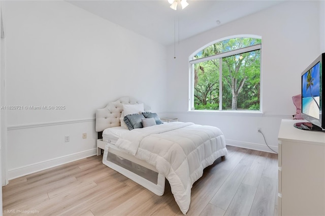 17050 SW 90th Ave, Palmetto Bay, FL 33157 - bedroom with light wood-type flooring and baseboards