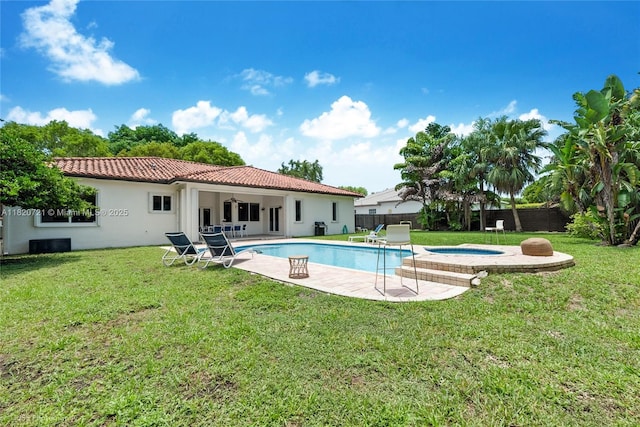 17050 SW 90th Ave, Palmetto Bay, FL 33157 - outdoor pool featuring a fenced backyard, an in-ground hot tub, and a patio area