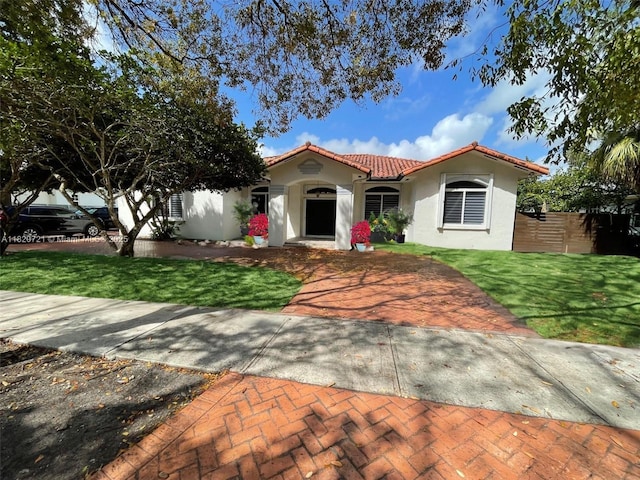 17050 SW 90th Ave, Palmetto Bay, FL 33157 - mediterranean / spanish house featuring stucco siding and a tiled roof