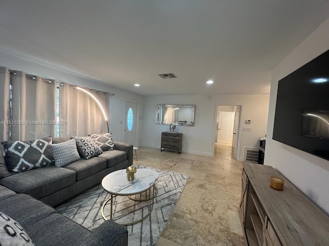 3338 Taft St, Hollywood, FL 33021 - living room with recessed lighting and light stone finish flooring