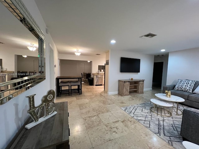 3338 Taft St, Hollywood, FL 33021 - living room featuring baseboards and recessed lighting