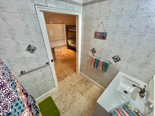 3338 Taft St, Hollywood, FL 33021 - bathroom with tile walls and vanity