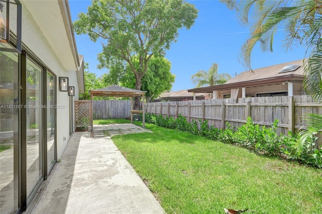 8511 NW 51st Ct, Lauderhill, FL 33351 - fenced backyard with a gazebo and a patio