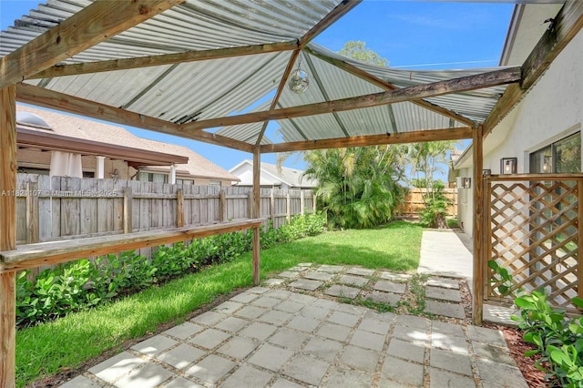 8511 NW 51st Ct, Lauderhill, FL 33351 - fenced backyard with a patio area