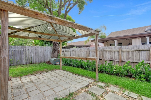 8511 NW 51st Ct, Lauderhill, FL 33351 - fenced backyard featuring a gazebo and a patio