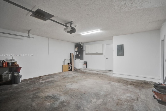 8511 NW 51st Ct, Lauderhill, FL 33351 - garage featuring electric panel, heating unit, and a garage door opener