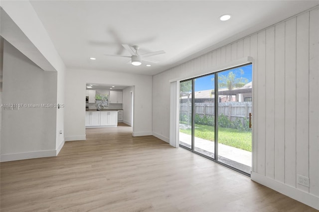 8511 NW 51st Ct, Lauderhill, FL 33351 - unfurnished living room with a ceiling fan, light wood-type flooring, and recessed lighting