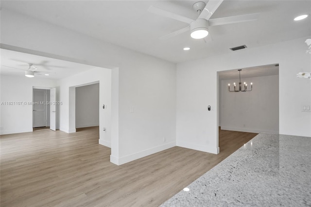 8511 NW 51st Ct, Lauderhill, FL 33351 - spare room with ceiling fan, a chandelier, recessed lighting, and wood finished floors