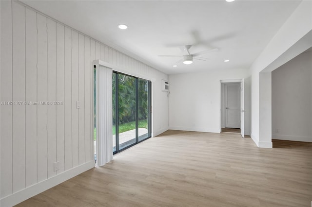 8511 NW 51st Ct, Lauderhill, FL 33351 - spare room featuring light wood-style flooring, recessed lighting, a ceiling fan, and wooden walls