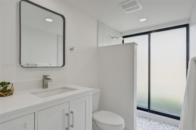 8511 NW 51st Ct, Lauderhill, FL 33351 - bathroom with plenty of natural light, a shower, vanity, and recessed lighting