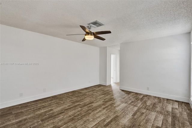 8511 NW 51st Ct, Lauderhill, FL 33351 - empty room with wood finished floors, a ceiling fan, and a textured ceiling