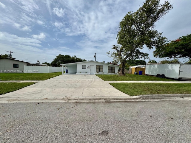 6213 NW 9th St, Margate, FL 33063 - view of front of property featuring driveway and a carport