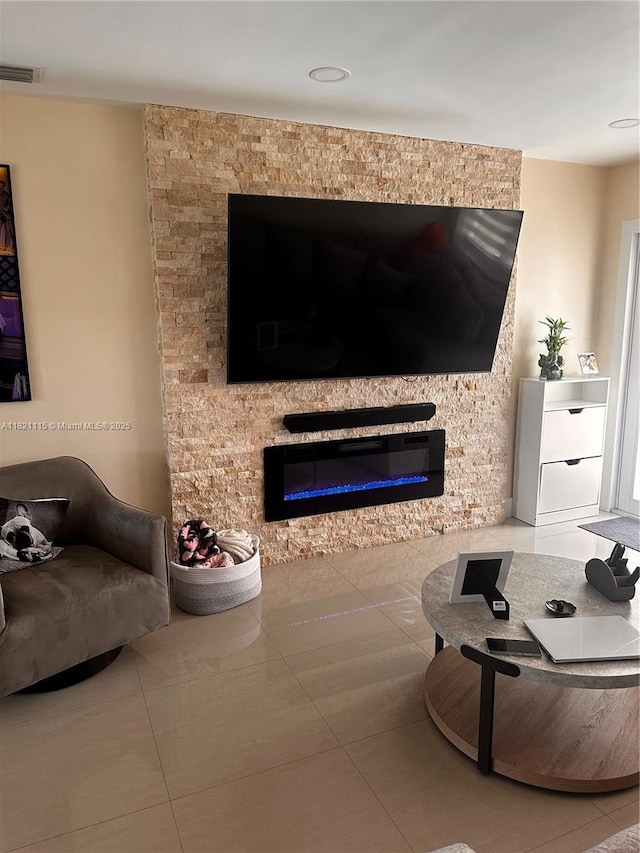 3250 NW 174th St, Miami Gardens, FL 33056 - living area with tile patterned floors and a fireplace