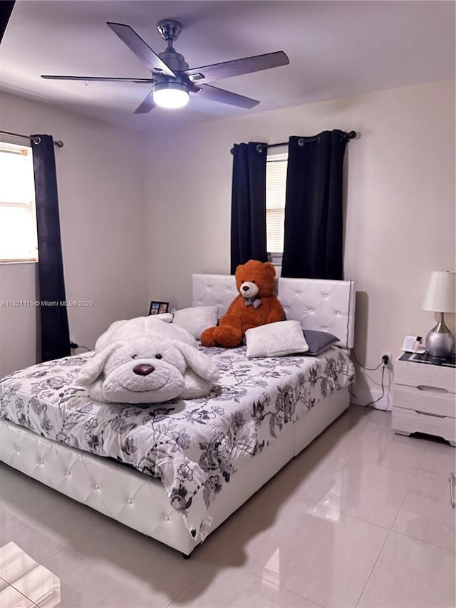 3250 NW 174th St, Miami Gardens, FL 33056 - bedroom with ceiling fan and marble finish flooring