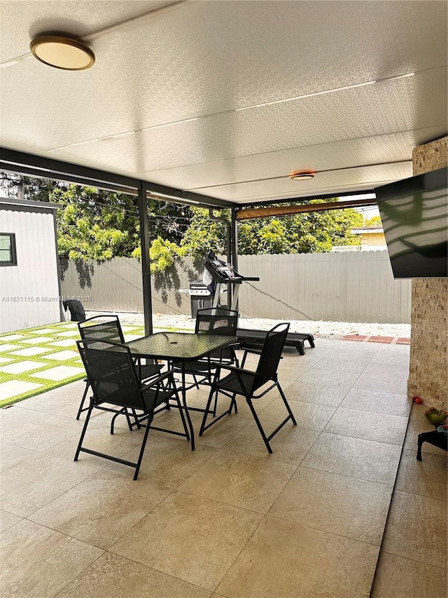 3250 NW 174th St, Miami Gardens, FL 33056 - fenced backyard with outdoor dining area and a patio