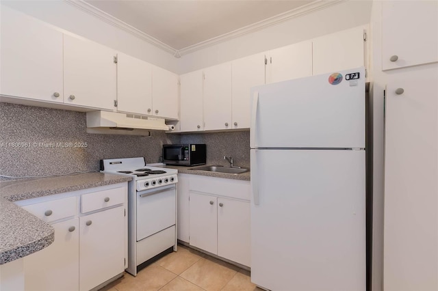 1300 Salzedo St Unit 4, Coral Gables, FL 33134 - kitchen featuring white appliances, under cabinet range hood, ornamental molding, decorative backsplash, and light tile patterned flooring