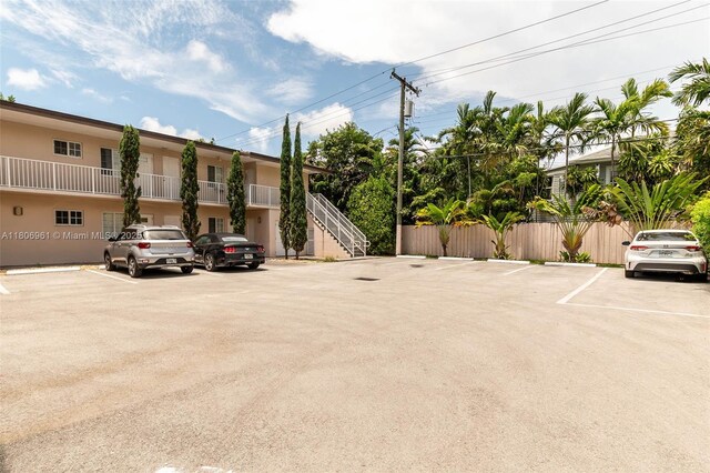 1300 Salzedo St Unit 4, Coral Gables, FL 33134 - uncovered parking lot featuring stairway