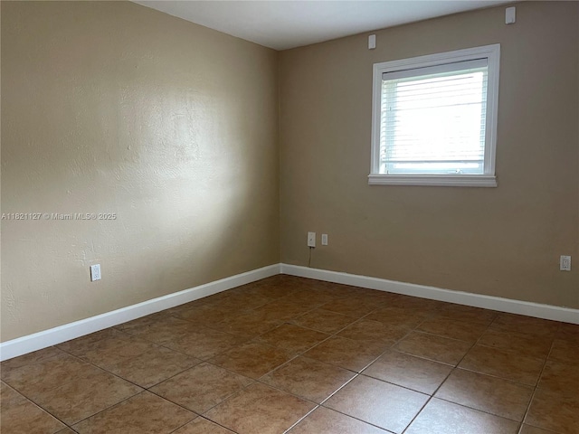 8603 SW 68th Ct Unit 27, Pinecrest, FL 33156 - tiled empty room with baseboards