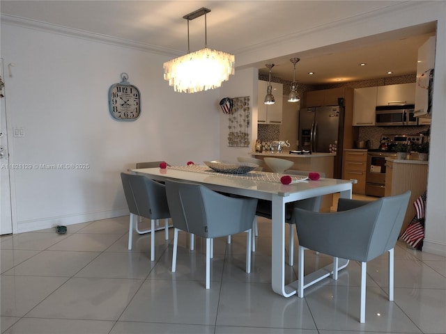575 Crandon Blvd Unit 706, Key Biscayne, FL 33149 - dining area with ornamental molding, light tile patterned flooring, and a chandelier