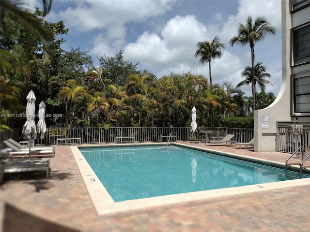 575 Crandon Blvd Unit 706, Key Biscayne, FL 33149 - community pool featuring a patio area