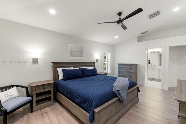 1020 SW 19th St SW, Naples, FL 34117 - bedroom with vaulted ceiling, recessed lighting, light wood-style flooring, connected bathroom, and a ceiling fan